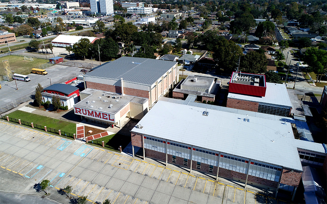 Rummel High School commercial leak repair project done by Roofing Solutions