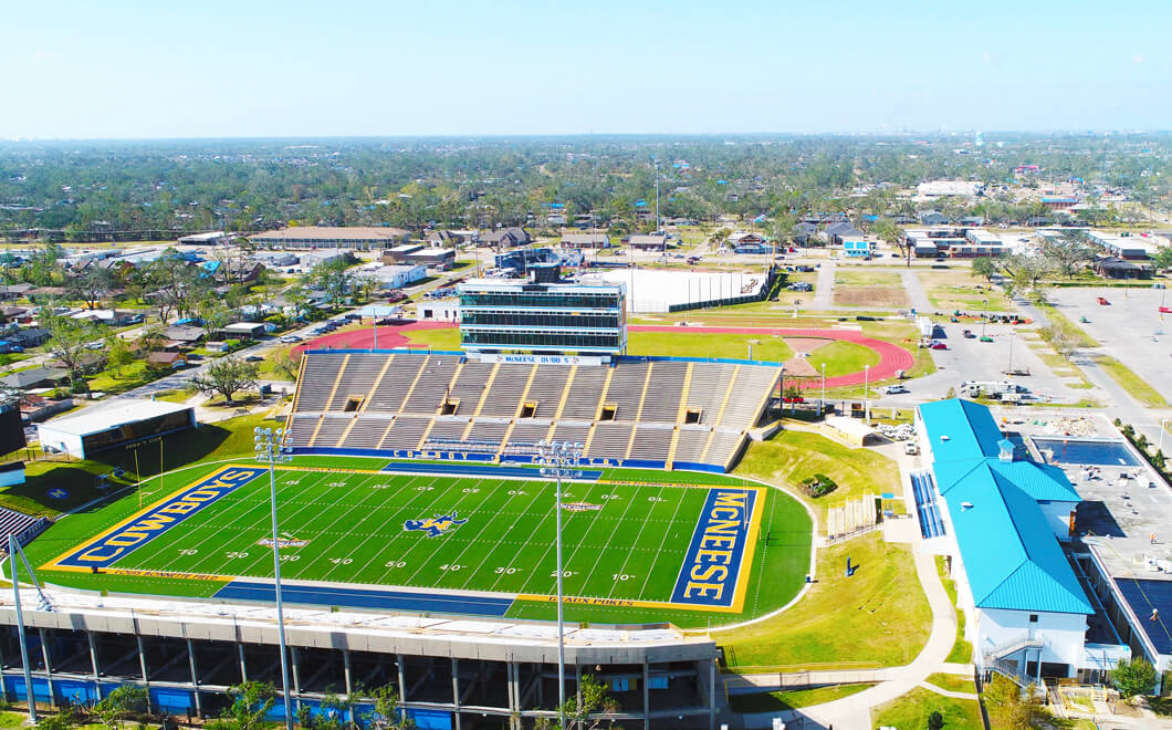 Storm damage roof repair to McNeese State University done by Roofing Solutions.